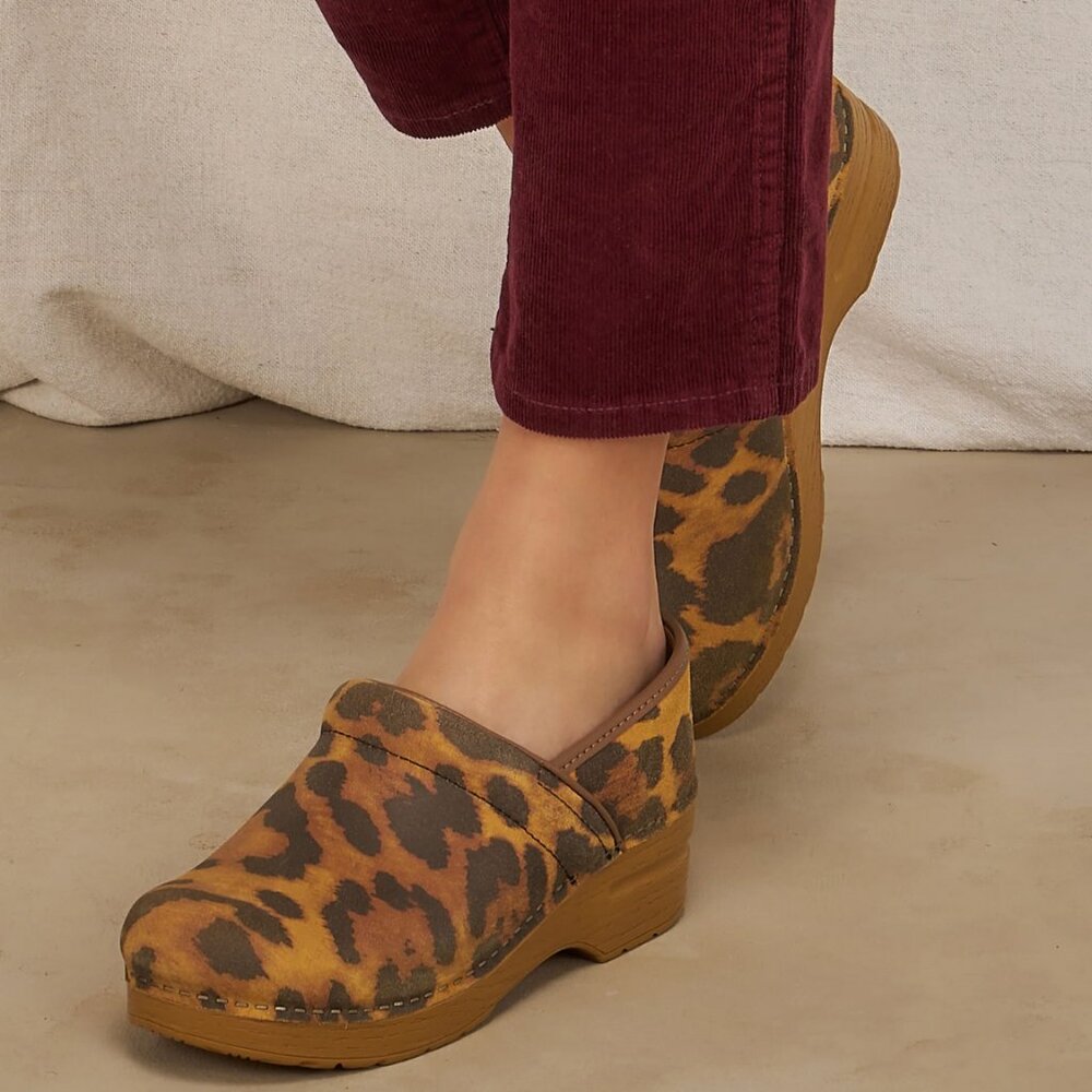 Dansko Animal Print Clogs with Wooden Sole